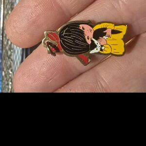 Yellow and Black Girl with Cat Pin